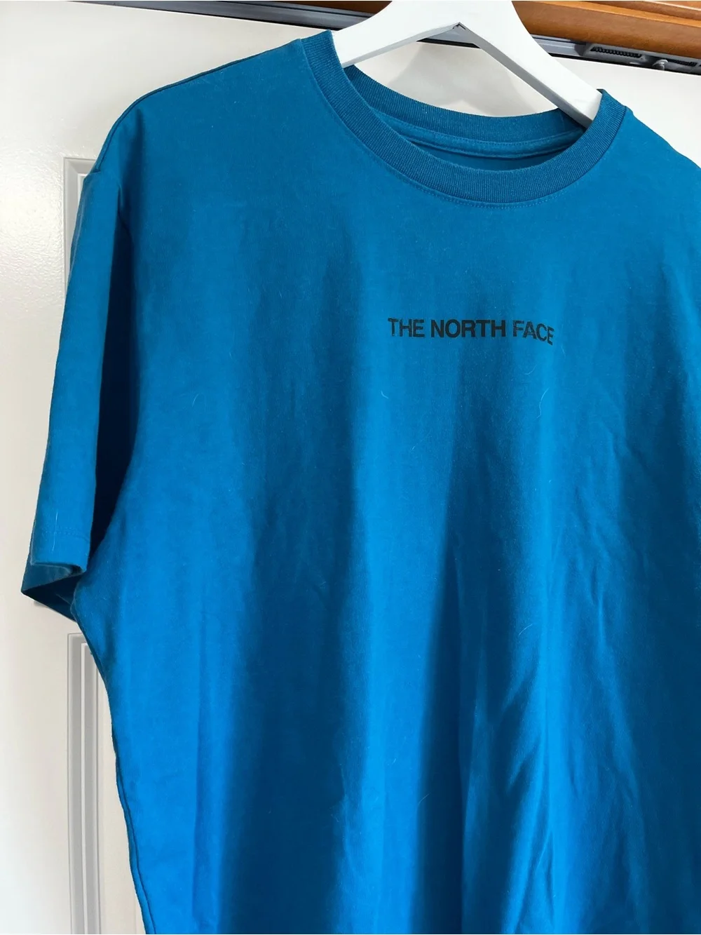 The North Face Men's Teal Blue Graphic Short Sleeve Tee
